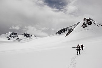 Kyrgyz and Swiss scientists continuing the mass balance measurements in Abramov glacier, Kyrgyzstan.jpg